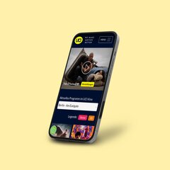 Customer presentation of Krankikom GmbH - presentation of the UCI Kinowelt customer project on a smartphone. A smartphone on which an UCI Kinowelt customer reference from the Krankikom GmbH portfolio is presented.